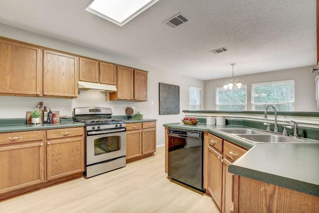 kitchen with stainless steel gas range, a sink, dishwasher, light wood-type flooring, and under cabinet range hood