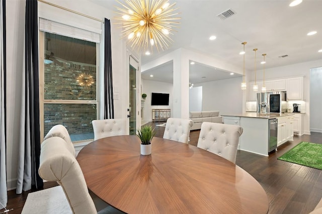 dining space featuring visible vents, recessed lighting, a chandelier, and dark wood-style floors