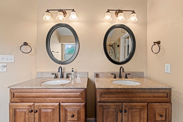 full bathroom with a sink and two vanities