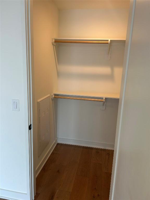 84 E Ave Unit 2207, Austin, TX 78701 - spacious closet featuring dark wood-type flooring