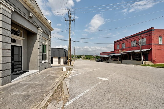 view of street with curbs