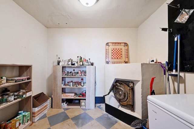 interior space featuring laundry area and tile patterned floors