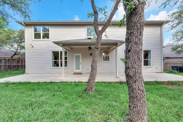 1205 Yountville Dr, Leander, TX 78641 - back of property with a patio and ceiling fan