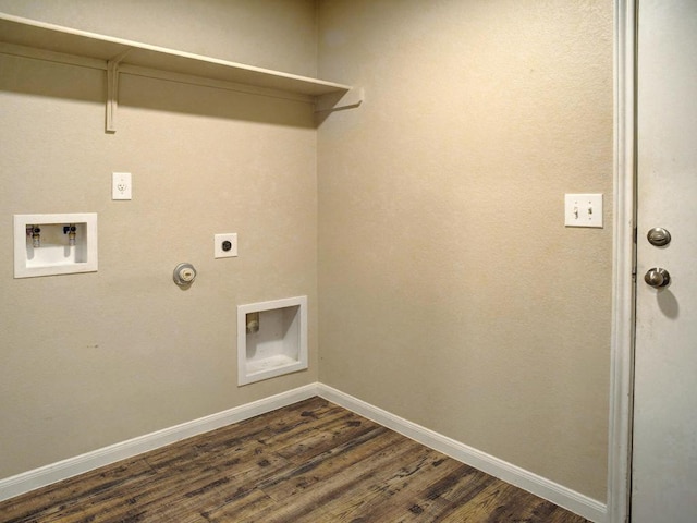 laundry area with gas dryer hookup, hookup for an electric dryer, laundry area, dark wood-style flooring, and baseboards