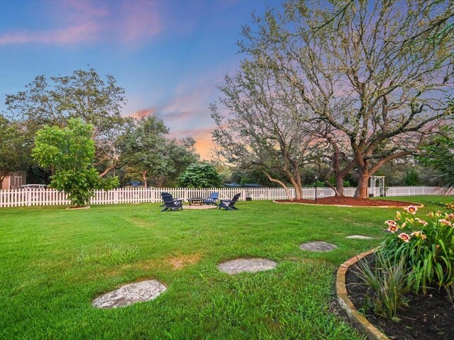 5709 Laguna Cliff Ln, Austin, TX 78734 - view of yard at dusk