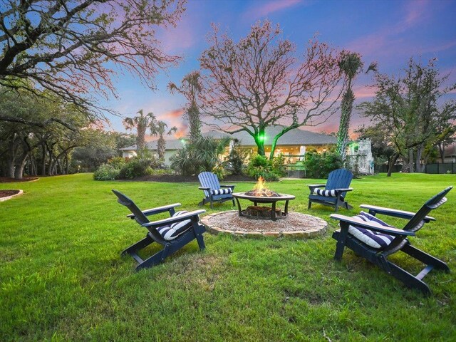 5709 Laguna Cliff Ln, Austin, TX 78734 - view of property's community featuring a fire pit and a lawn