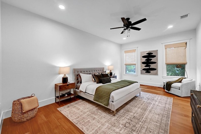 1200 Woodlawn St, Lockhart, TX 78644 - bedroom featuring wood finished floors, baseboards, recessed lighting, and a ceiling fan