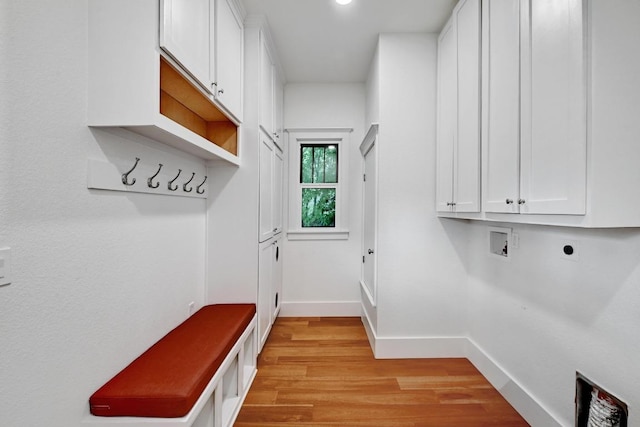 1200 Woodlawn St, Lockhart, TX 78644 - mudroom with light wood-style flooring and baseboards