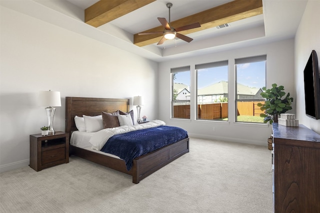 bedroom with baseboards, ceiling fan, light carpet, and visible vents