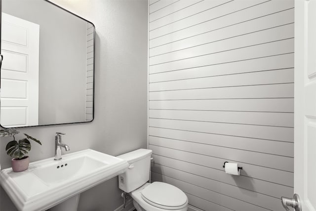 bathroom with a sink and toilet