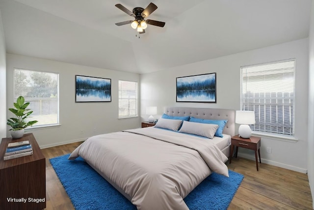 15205 Bullace St, Austin, TX 78724 - bedroom featuring vaulted ceiling, wood finished floors, baseboards, and ceiling fan