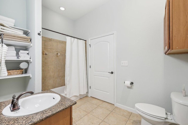 full bathroom featuring tile patterned flooring, a shower with shower curtain, toilet, and vanity