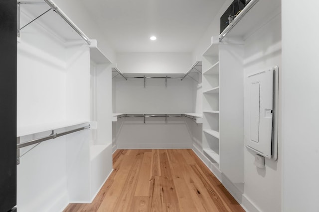 spacious closet featuring light wood-type flooring