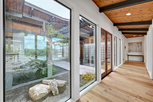 doorway to outside featuring wood finished floors, beamed ceiling, recessed lighting, wood ceiling, and french doors