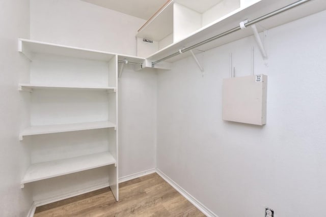 2206 Weiss Ln, Georgetown, TX 78626 - spacious closet featuring wood finished floors