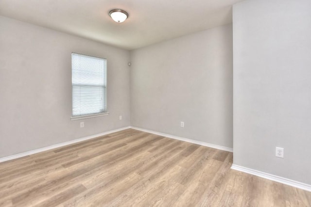 2206 Weiss Ln, Georgetown, TX 78626 - spare room with light wood finished floors and baseboards