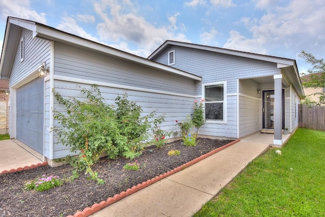 2206 Weiss Ln, Georgetown, TX 78626 - view of front of house featuring an attached garage and fence