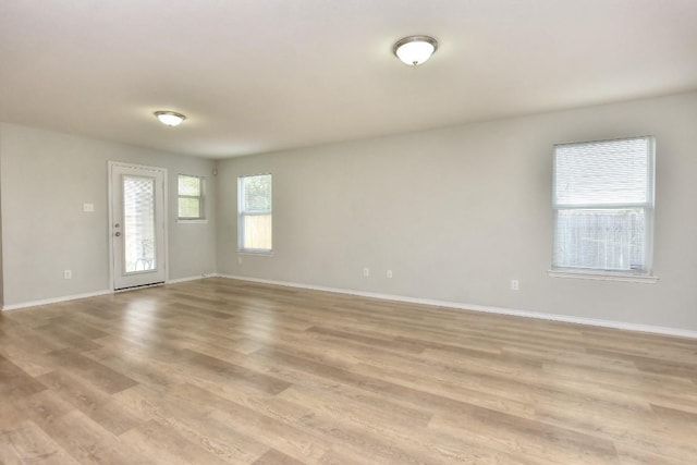 2206 Weiss Ln, Georgetown, TX 78626 - empty room featuring light wood finished floors and baseboards