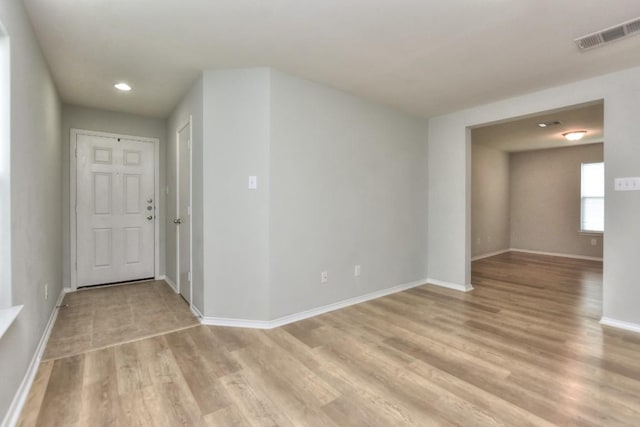 2206 Weiss Ln, Georgetown, TX 78626 - empty room with light wood-style floors, baseboards, and recessed lighting