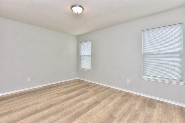 2206 Weiss Ln, Georgetown, TX 78626 - spare room with light wood finished floors and baseboards