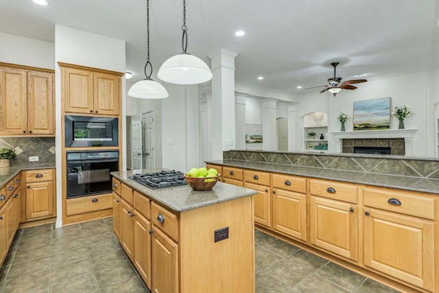 kitchen featuring a ceiling fan, a kitchen island, backsplash, black appliances, and recessed lighting