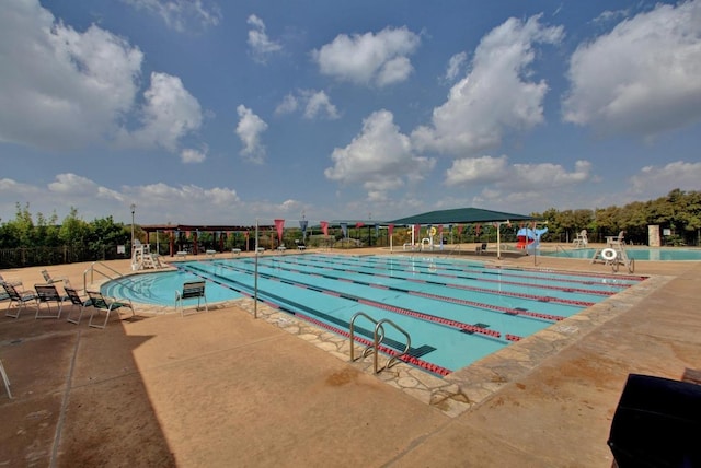 2408 Tivoli Dr, Cedar Park, TX 78613 - community pool featuring a patio area