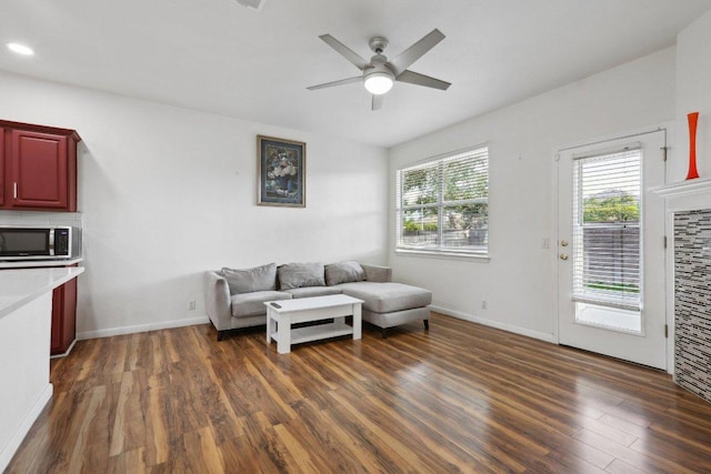 8117 Manx Dr, Round Rock, TX 78681 - living room featuring dark wood-type flooring and a ceiling fan