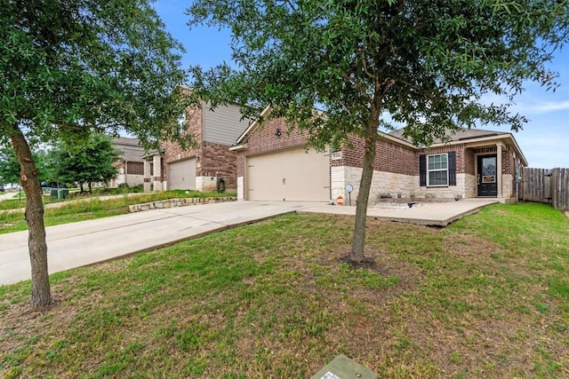 13516 William Mckinley Way, Manor, TX 78653 - view of front facade with concrete driveway, a garage, stone siding, and brick siding