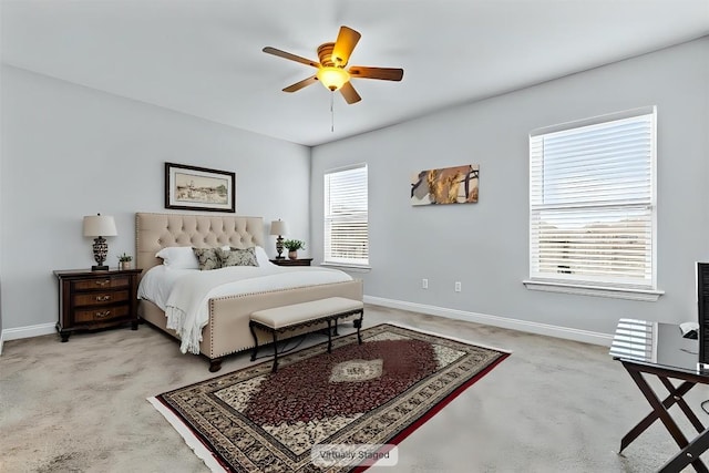13516 William Mckinley Way, Manor, TX 78653 - bedroom with light carpet, baseboards, and a ceiling fan