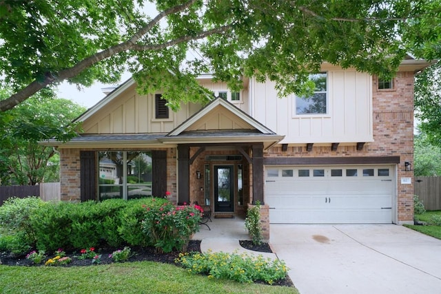 112 Bearing Cv, Austin, TX 78717 - craftsman house featuring board and batten siding, driveway, brick siding, fence, and an attached garage