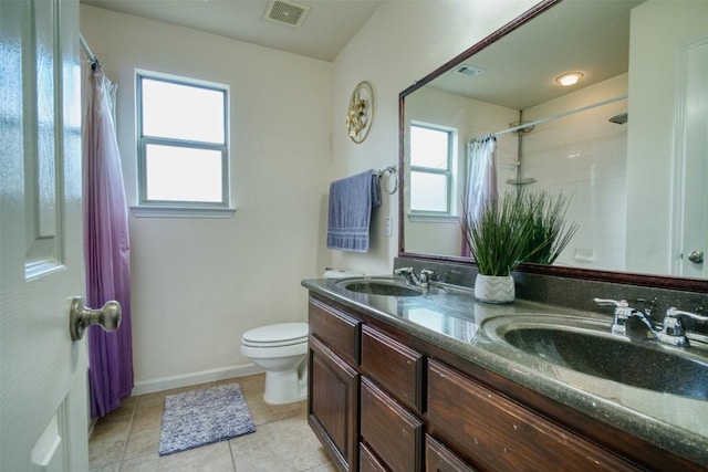 112 Bearing Cv, Austin, TX 78717 - full bath featuring a sink, tile patterned floors, toilet, and visible vents