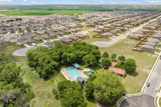birds eye view of property with a residential view