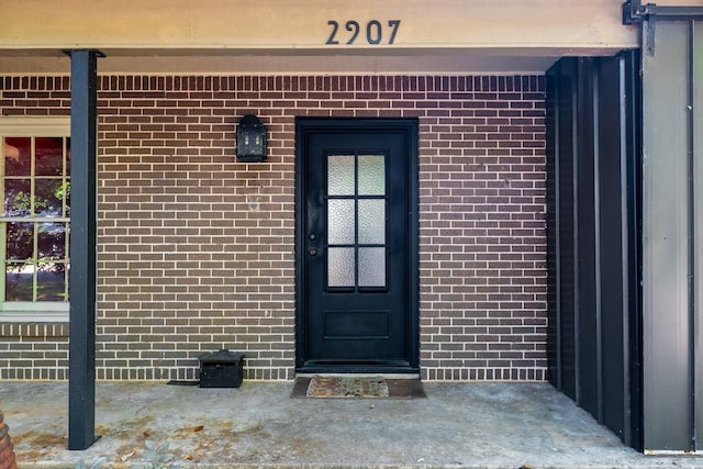 2907 Pinecrest Dr, Austin, TX 78757 - property entrance with brick siding