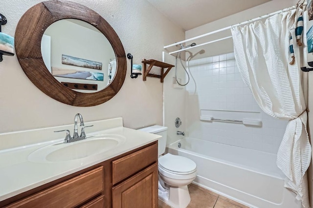 full bathroom with vanity, toilet, tile patterned flooring, and shower / bath combo with shower curtain