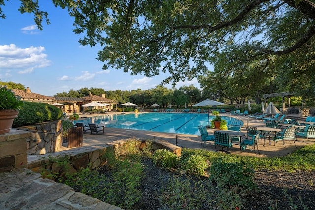 228 Cimarron Hills Trl E, Georgetown, TX 78628 - community pool featuring a patio area