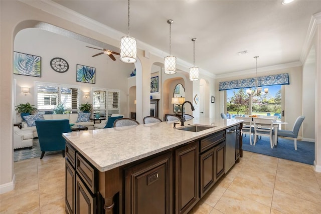 228 Cimarron Hills Trl E, Georgetown, TX 78628 - kitchen featuring arched walkways, a chandelier, dishwasher, plenty of natural light, and crown molding