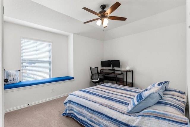 bedroom featuring carpet floors, a ceiling fan, and baseboards