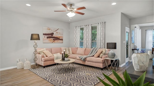 1621 Winding Stream Trl, Leander, TX 78641 - living area with wood finished floors, baseboards, ceiling fan, and recessed lighting