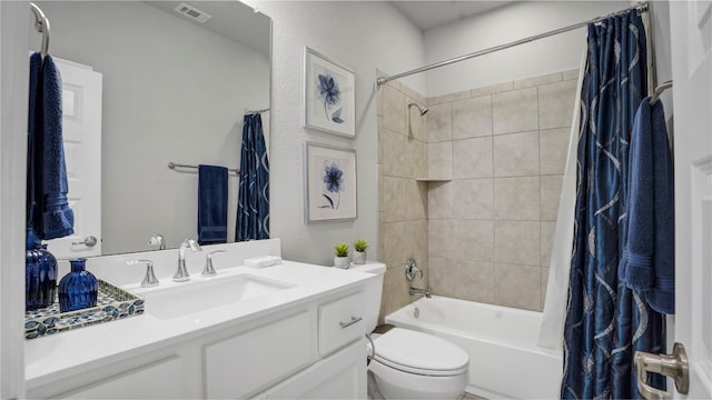 1621 Winding Stream Trl, Leander, TX 78641 - bathroom with shower / tub combo with curtain, vanity, and toilet