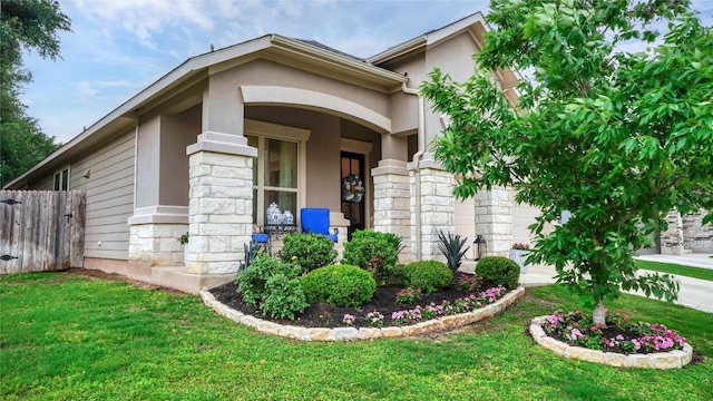 1621 Winding Stream Trl, Leander, TX 78641 - property entrance featuring an attached garage, stone siding, and stucco siding