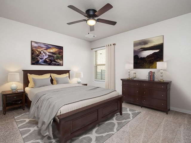 bedroom with baseboards, light carpet, and ceiling fan