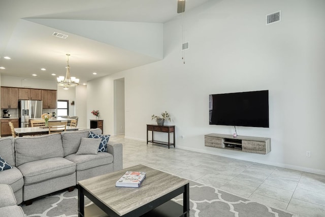 532 Tanda Ln, Hutto, TX 78634 - living area with recessed lighting, a chandelier, a ceiling fan, and high vaulted ceiling
