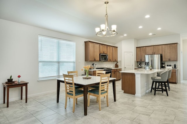 532 Tanda Ln, Hutto, TX 78634 - dining room with a chandelier, recessed lighting, and lofted ceiling