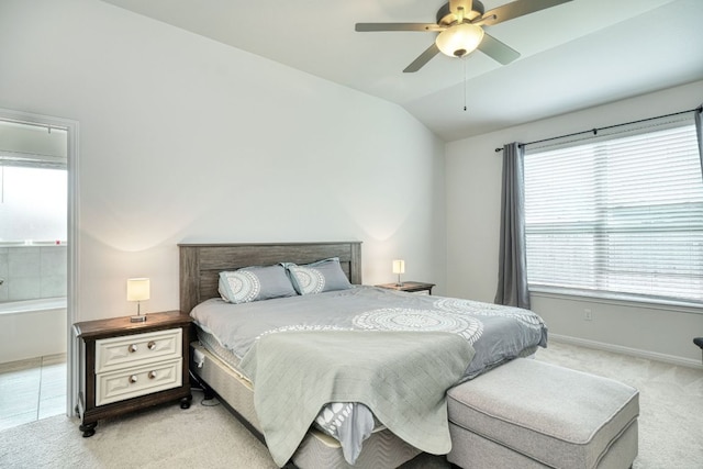 532 Tanda Ln, Hutto, TX 78634 - bedroom with light carpet, vaulted ceiling, a ceiling fan, and attic access