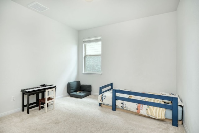 misc room featuring visible vents, carpet flooring, and baseboards