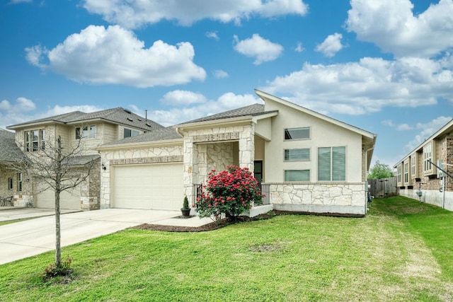view of front of property with an attached garage, a front lawn, stone siding, and concrete driveway