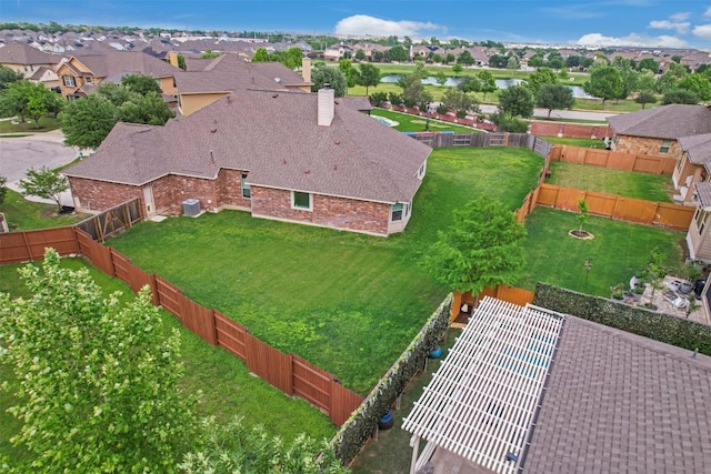 bird's eye view featuring a water view and a residential view