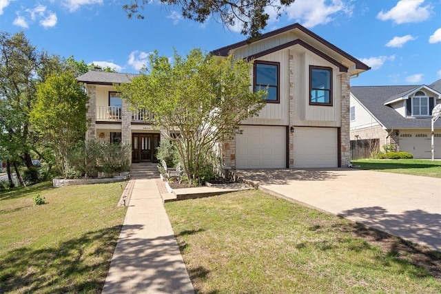 9800 Knotty Pine Cv, Austin, TX 78750 - view of front of home featuring a front yard, driveway, stone siding, and a garage