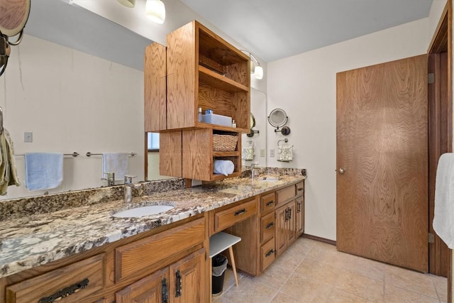 9800 Knotty Pine Cv, Austin, TX 78750 - bathroom featuring a sink and double vanity