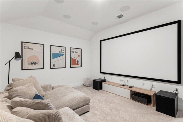 8401 Hubble Walk, Austin, TX 78744 - cinema room featuring carpet flooring, lofted ceiling, and baseboards